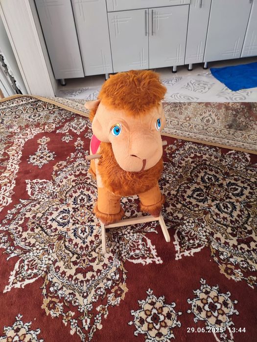 Продам игрушку качалку верблюд