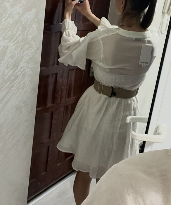 Елегантна рокля.