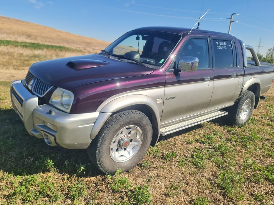 Mitsubishi L200 2005 116 hp