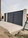 Construim garduri si porti din sipca metalica, panouri stil jaluzele,