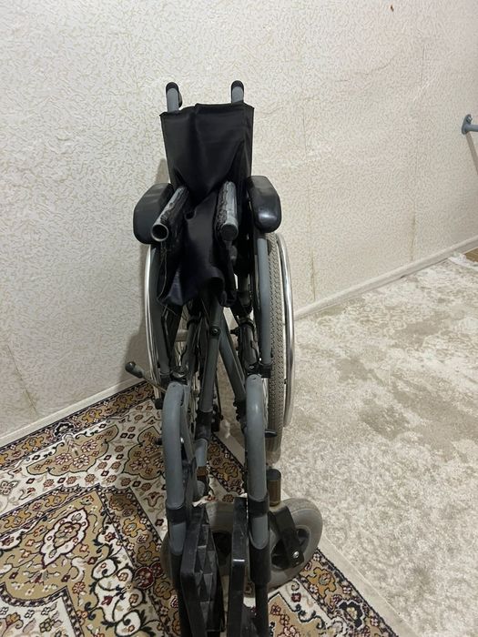 Инвалидная коляска
