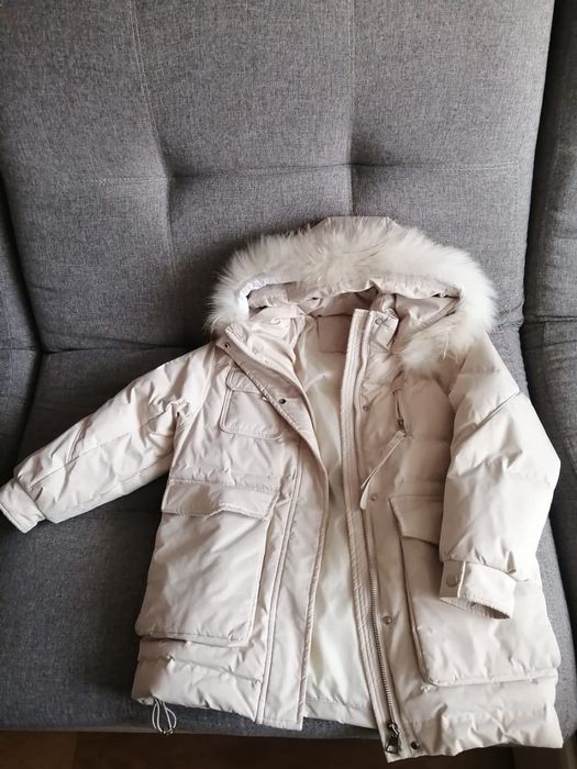 Продам пуховик 135-140см