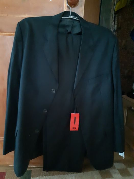 Мужской новый костюм