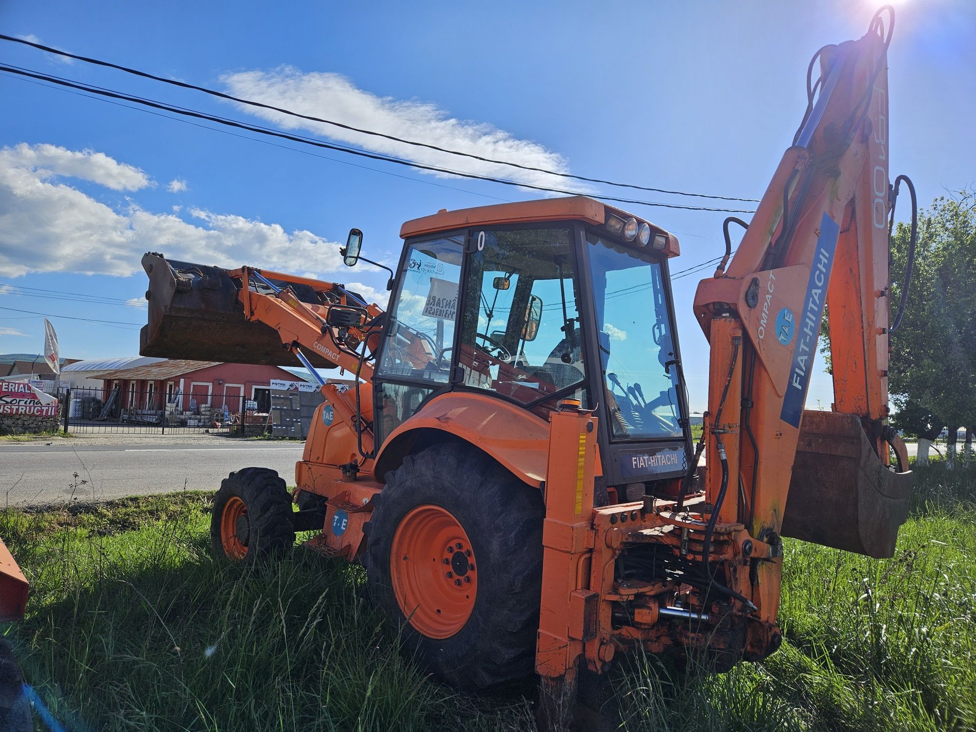 Buldoexcavator  KOMATSU