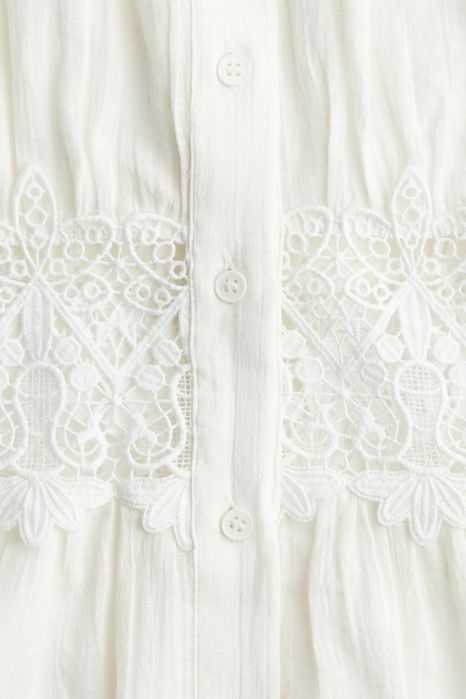 Платье от марки H&M с этикеткой размер М