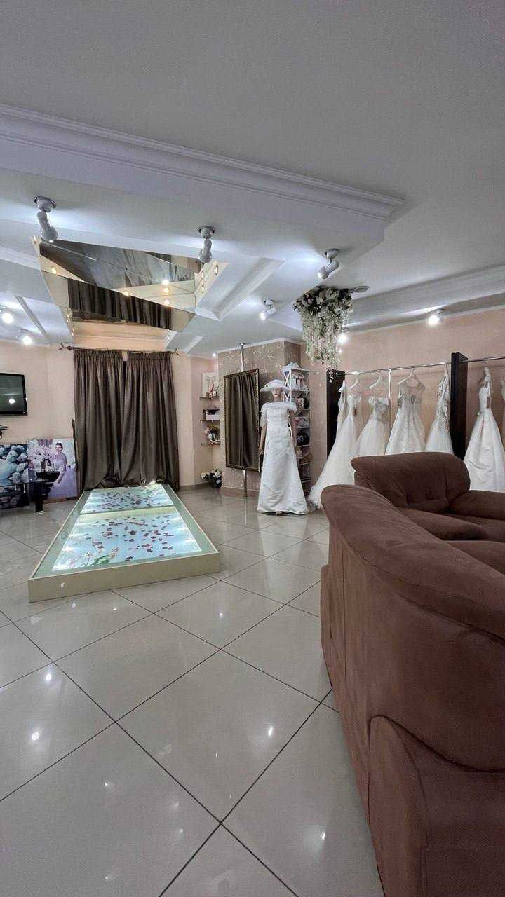 Продам  бизнес - свадебный салон с 10 летним стажем и   базой клиентов