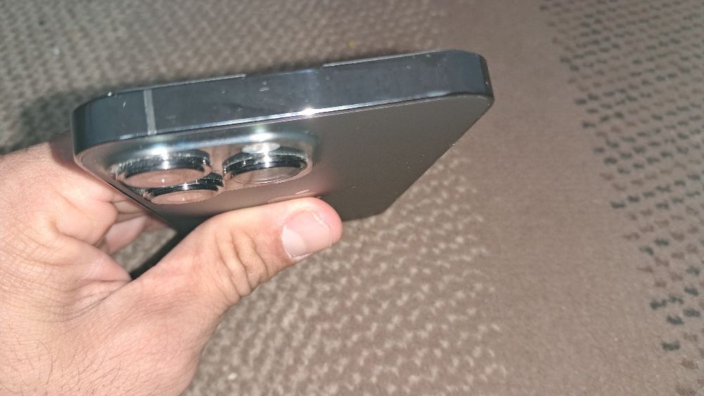 iPhone 13 pro holati zoʻr. Batareyka yomksti 91 foiz.