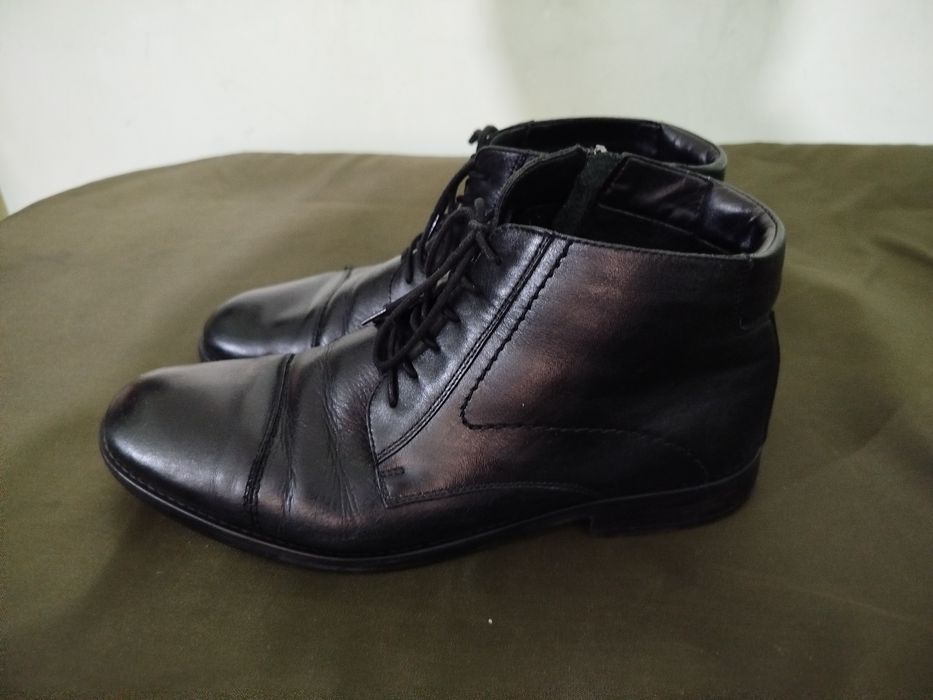 Продам фирменные сапоги.