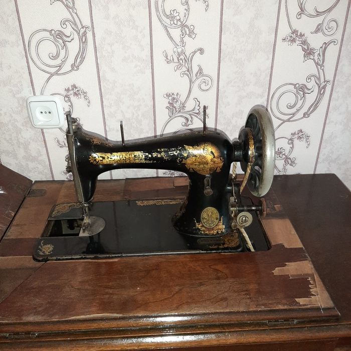 Продам швейную машинку Singer