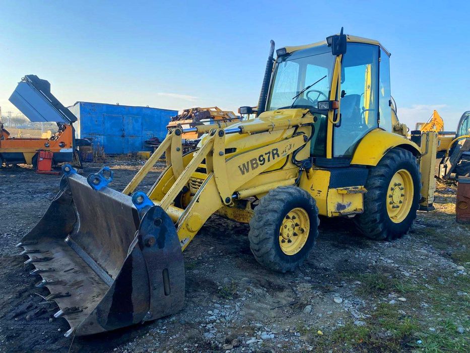 Buldoexcavator Komatsu WB97R an 2001 CupăMultifuncțională BrațTelescop
