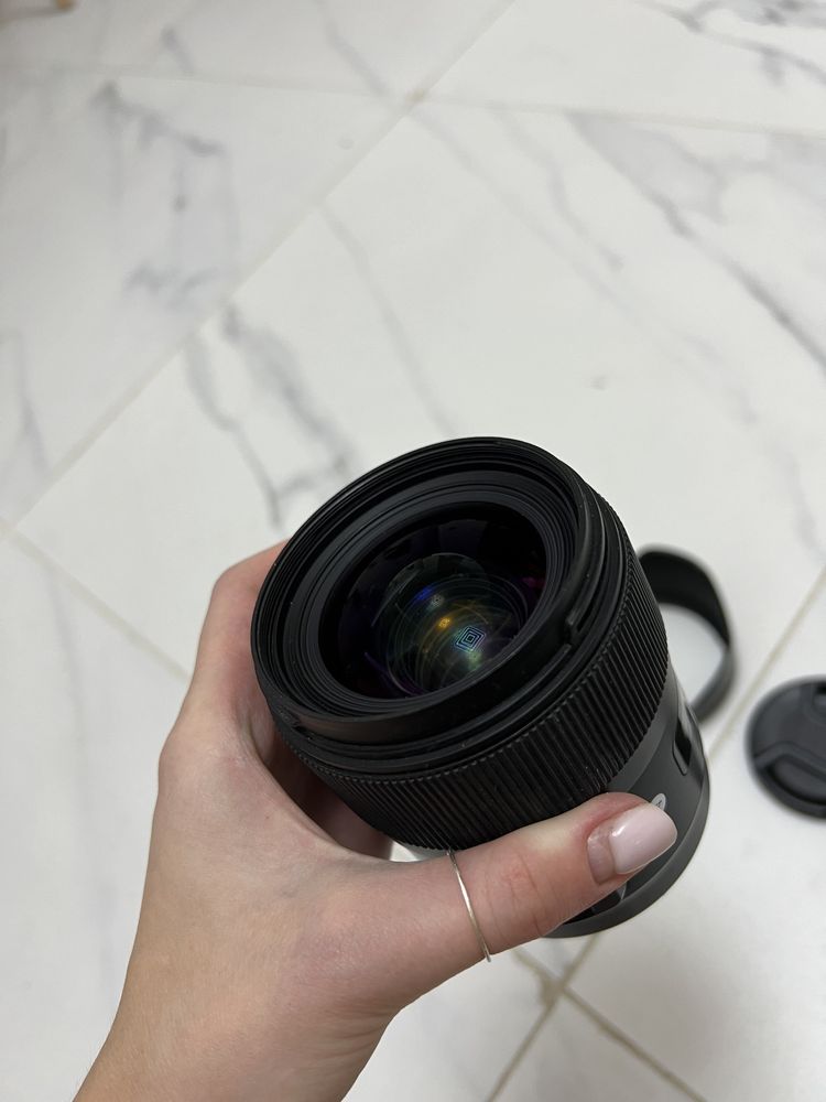 Sigma 35 mm 1.4 объектив