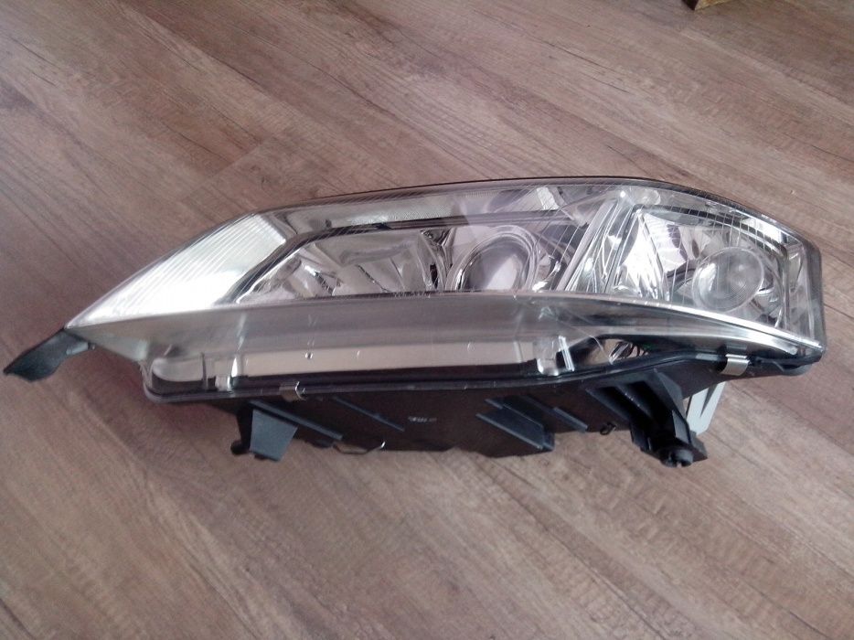 ляв фар- Нов- Audi А6 c5 до 05' Hella