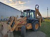 Buldoexcavator  case 590 super LE