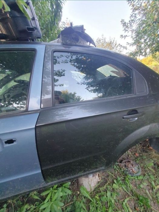 Ușa Chevrolet Aveo sedan 2006-2011 sofer fata spate albastra neagra