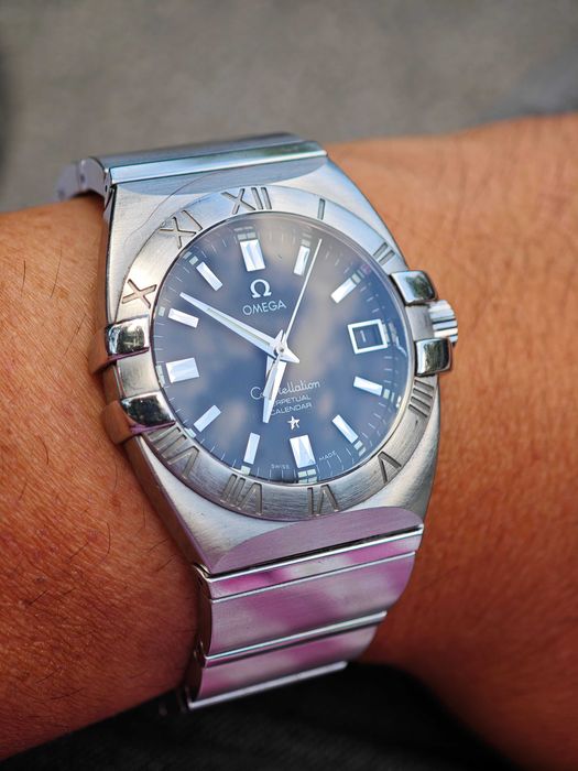 БАРТЕР Omega Constellation Double Eagle Perpetual Calendar