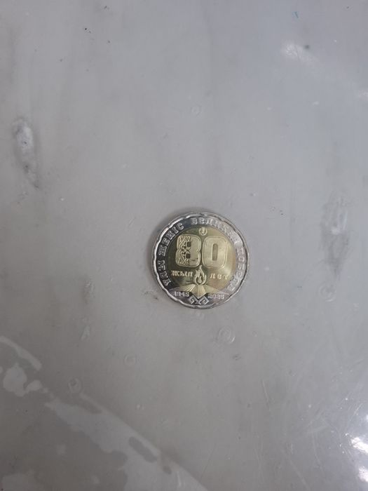 Монета 200тг оригинал