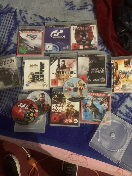 Ps3 cu 13 jocuri plus maneta
