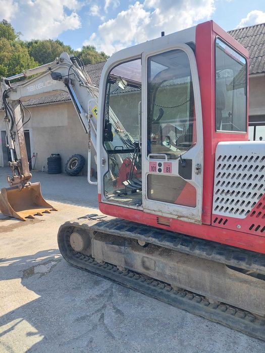 EXCAVATOR Takeuchi,senile de cauciuc,4 cupe