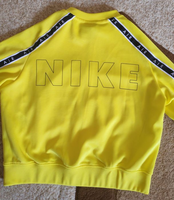 Bluza Nike marimea XS,de culoare galbena ,impecabila.