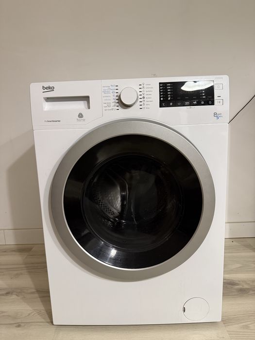 Masina de spalat cu uscator cald Beko HTV8733XS0