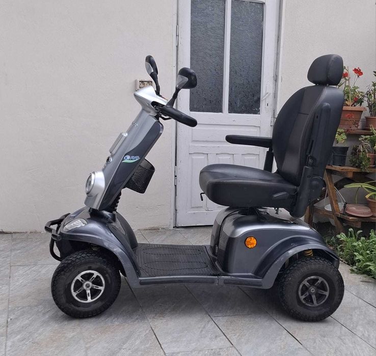 Scuter dizabilitati Kymco For U cu 4 roti 15km/h, 180kg, baterii 100Ah
