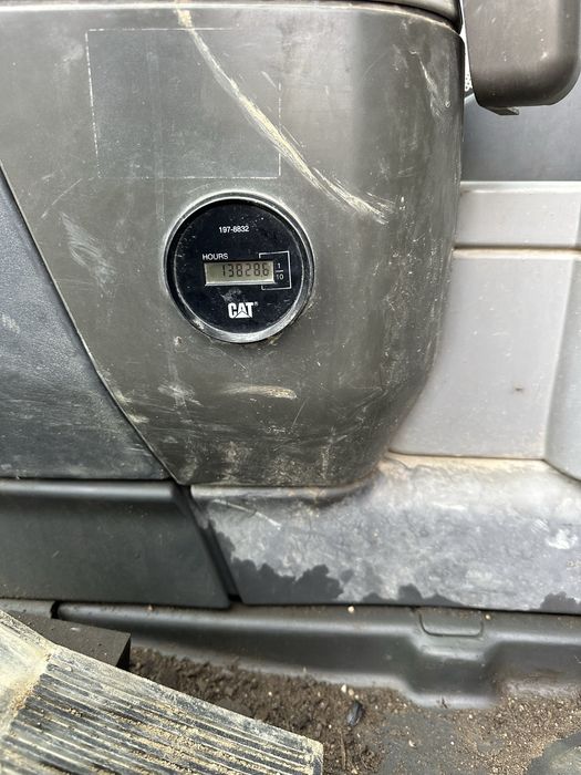 Vand excavator pe pneuri Cat M313D