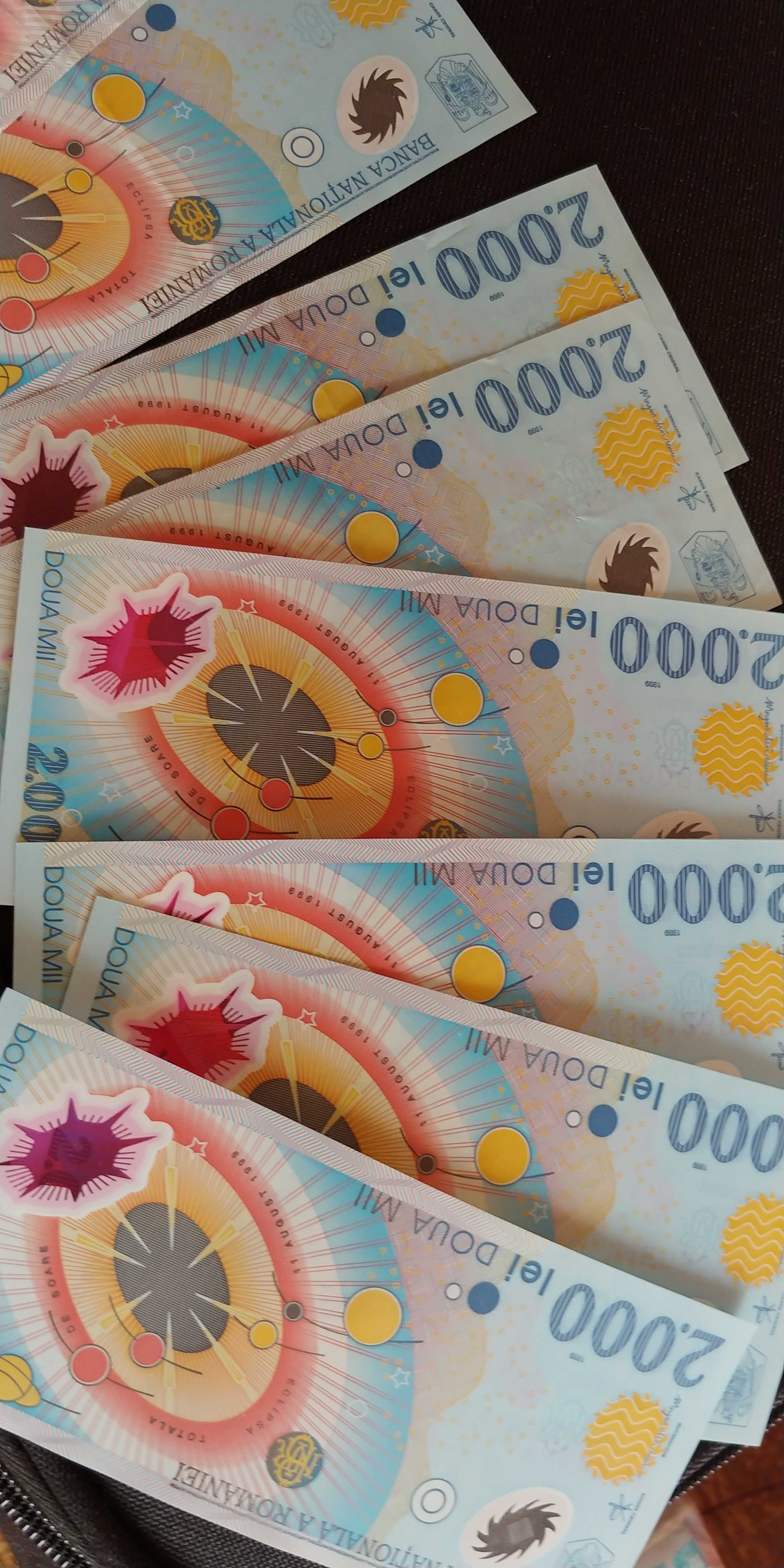 Zece bancnote 2000 lei cu eclipsa solara