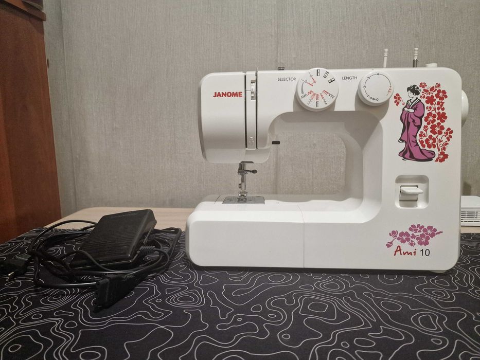 Швейная машинка Janome Ami 10