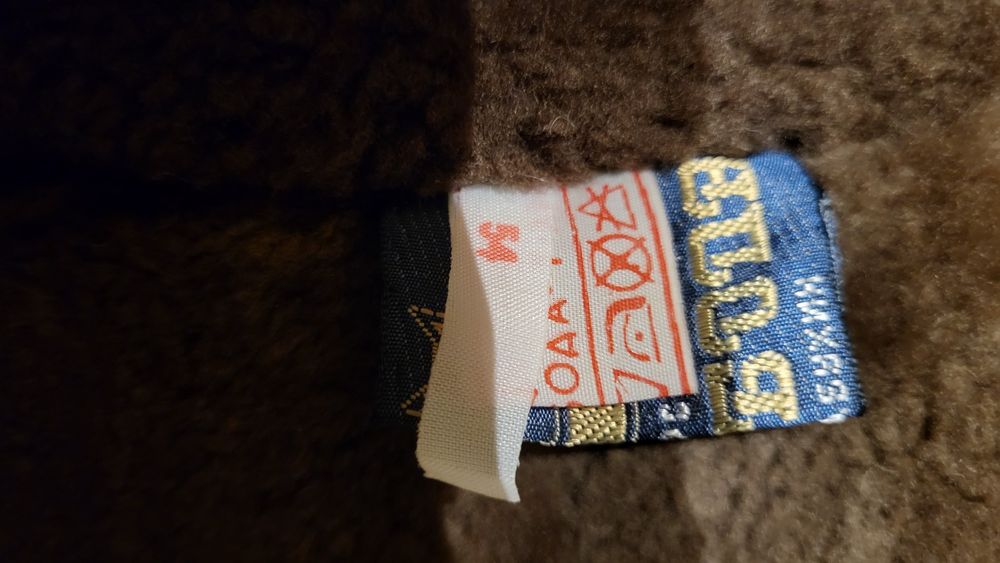 Дълга работна шуба с подплата от овча вълна.