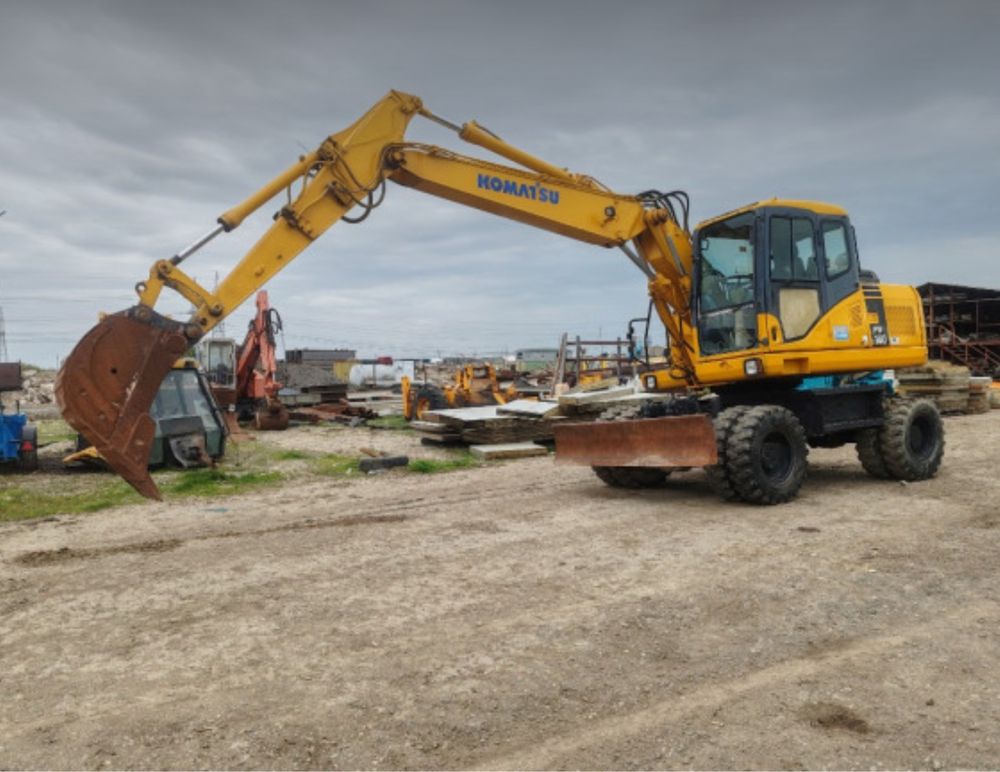 Excavator pe Roti Komatsu PW140-7
