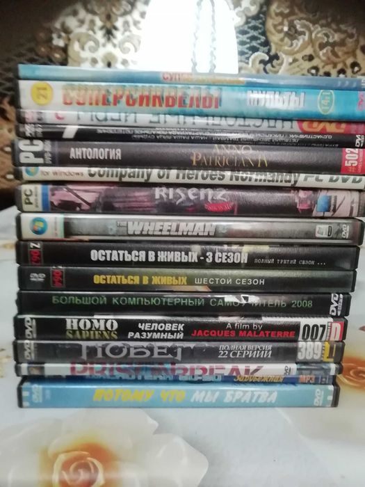 CD-диски с мультиками, художественными фильмами и др.