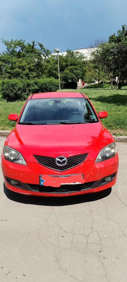 Автомобил Мазда 3