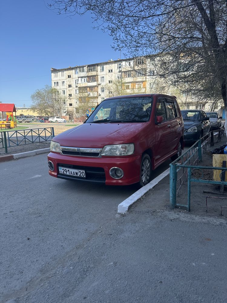 Автомобиль nissan cube