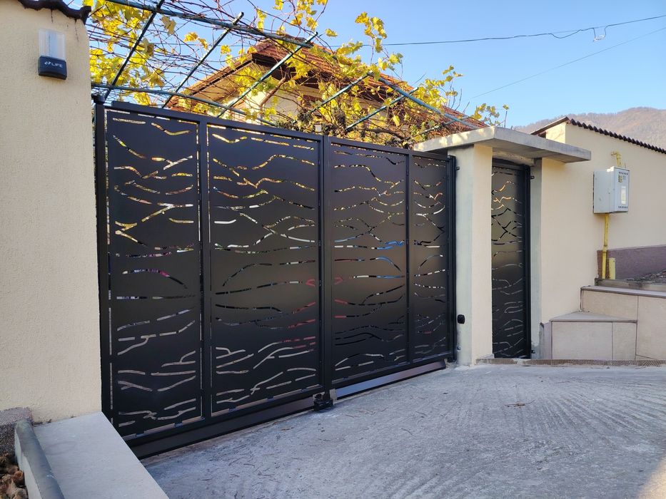 Porți, panouri gard, balustrade din tabla debitata cu plasma cnc