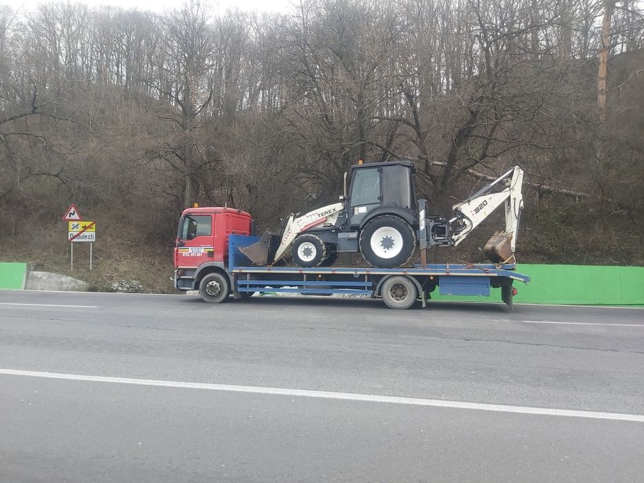 Transport buldo excavatoare,utilaje,tractoare,inchiriez platforma trai