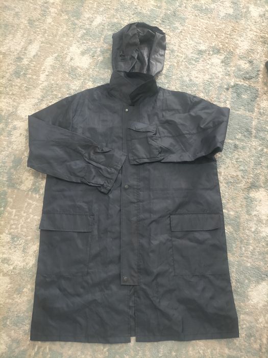 Продается  плащ дождевик новый