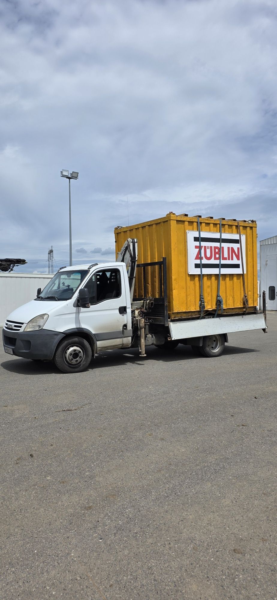 Transport materiale construcții cu macara