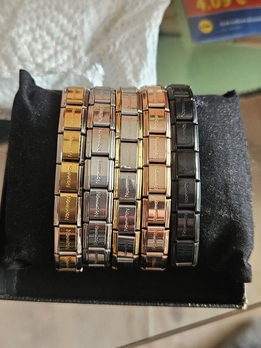 Гривна Nomination.