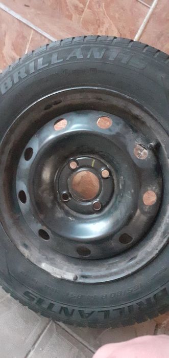 Vând un set de roti de logan pe 14 cu capace cu tot(165/80/14) 5 bucat