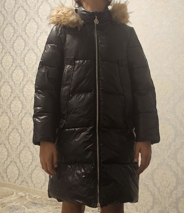 Продам зимнюю куртку,ростовка 134