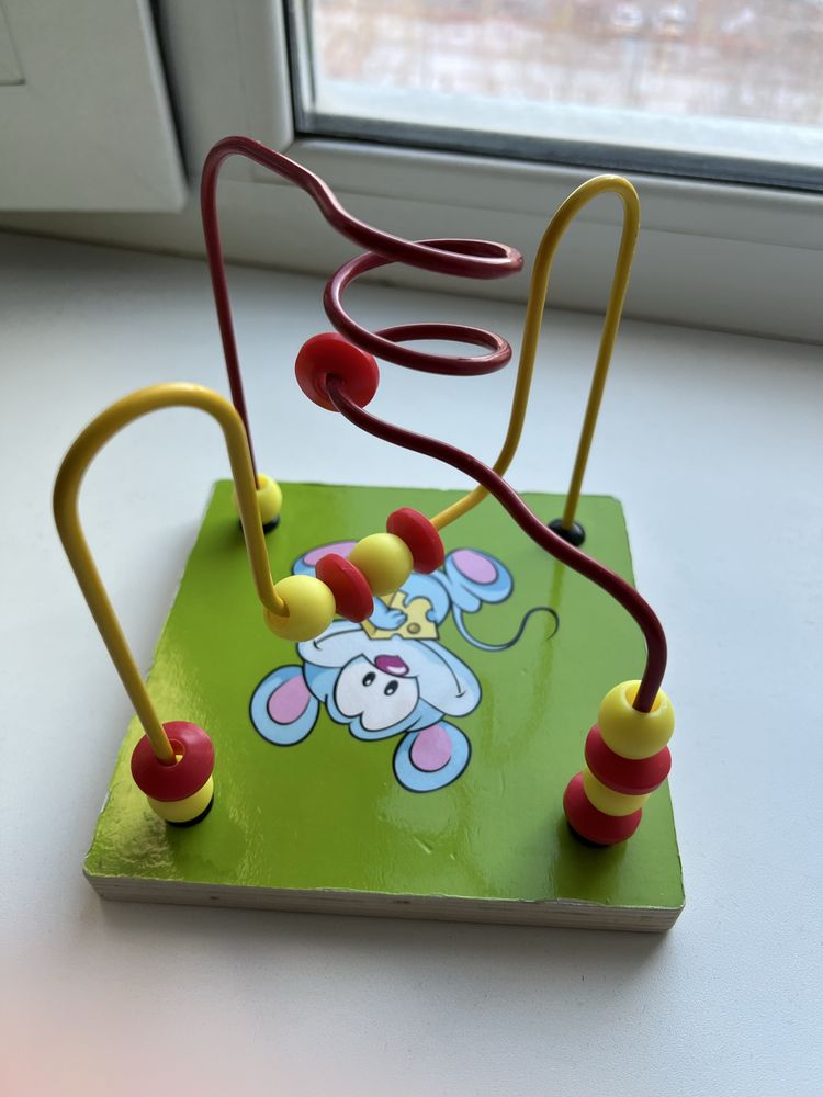 Развивающая игрушка из дерева