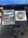 Consolă PlayStation 3 Slim (300GB) + 2 Jocuri + Controller
