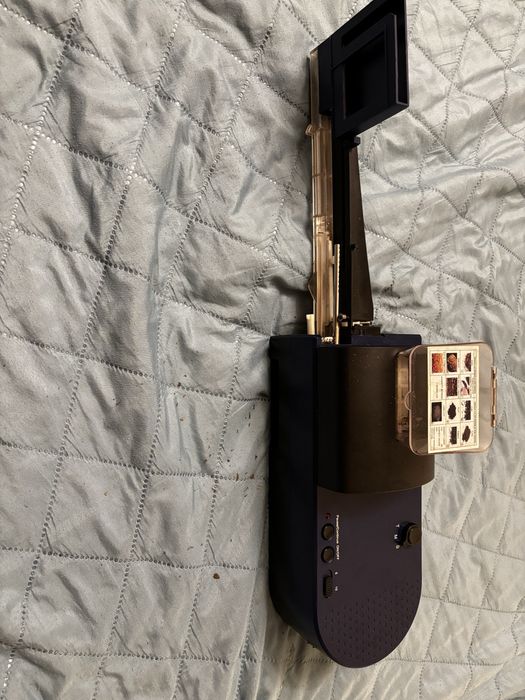 Masina electrica automata de facut tigari /injectat tutun in tuburi.