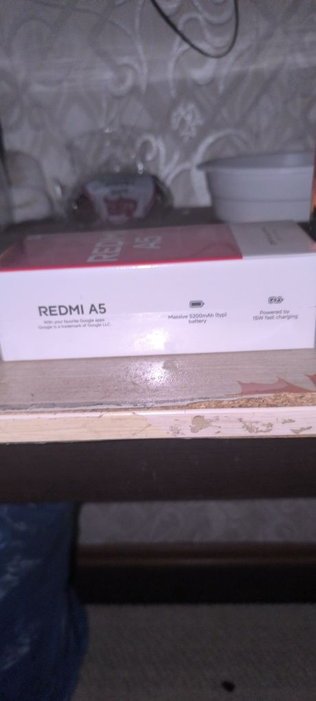 Redmi 5a  5200 mAh zaryadi ko'pga yetad 3/64 gp 32mp kamera yangi