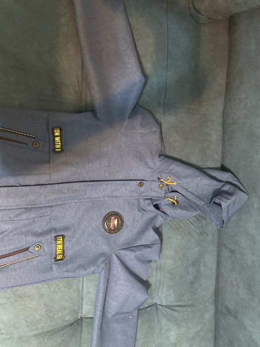 Продам синию куртку