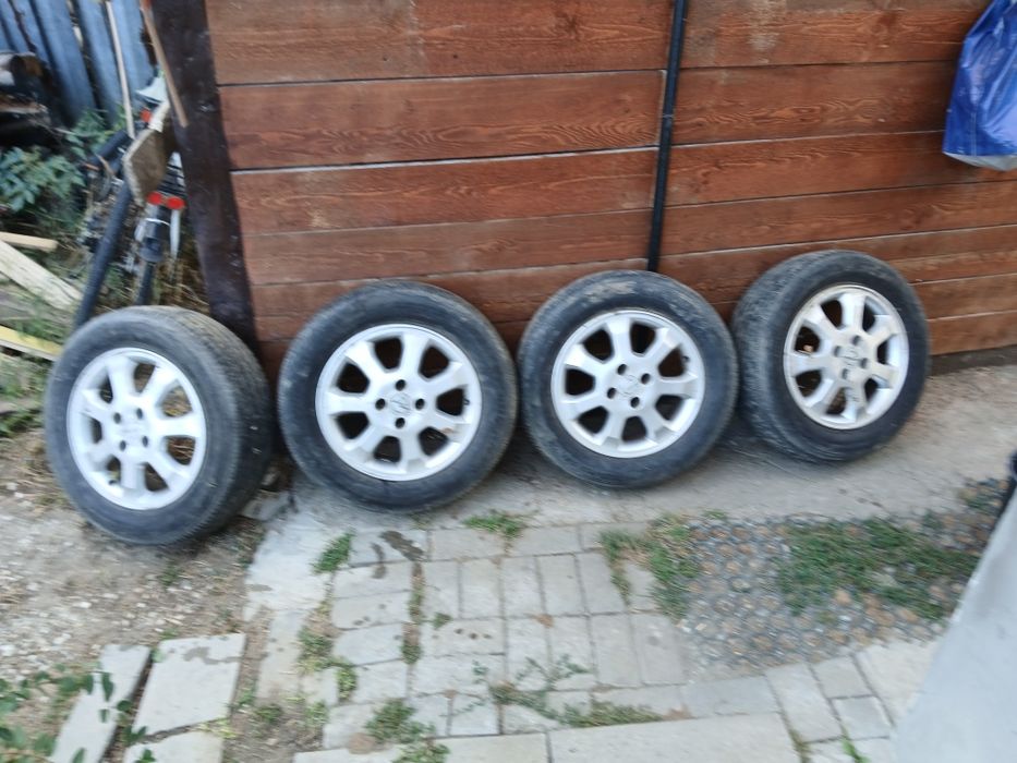 Vând 4 jante cu 4 anvelope opel astra logan