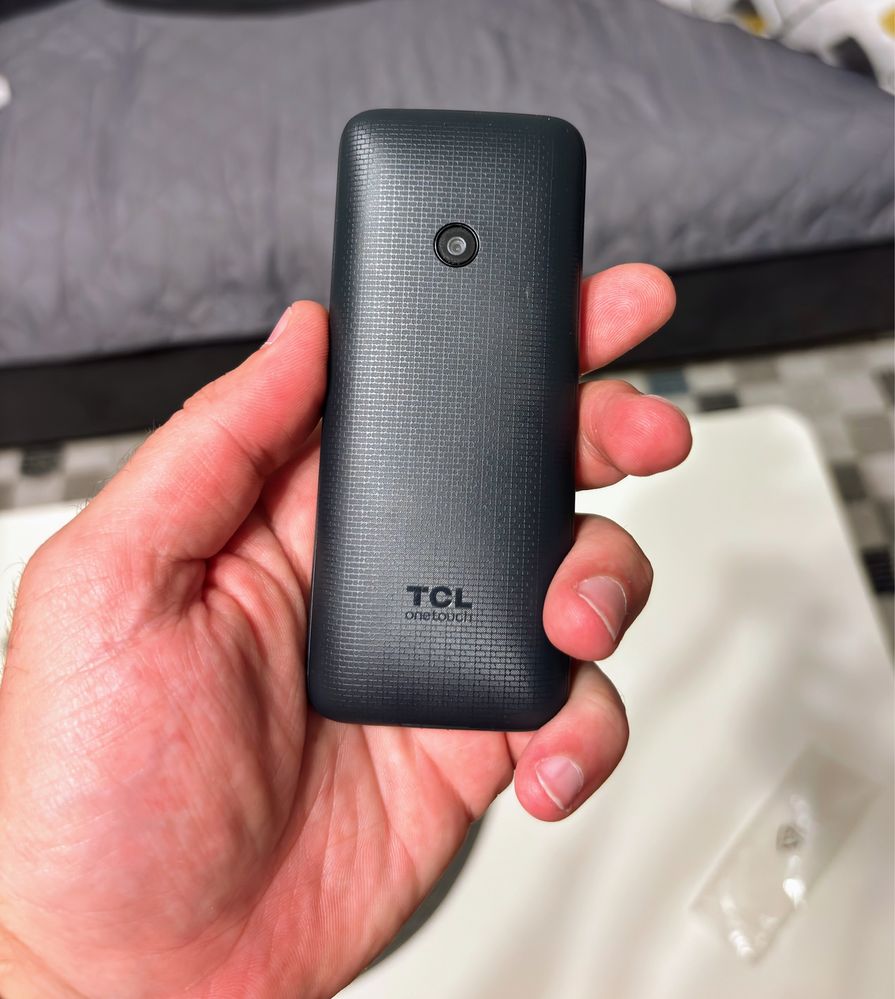 Телефон с копчета TCL
