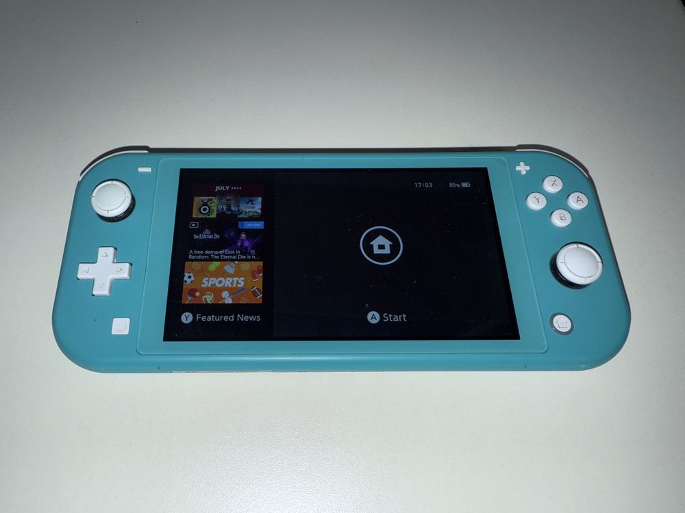 Nintendo Switch lite, turcoaz, functioneaza impecabil + husa + folie