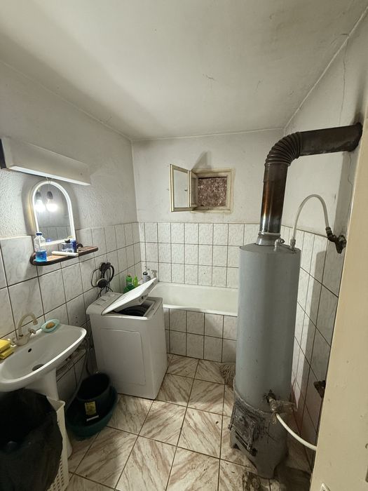 Casă cu 24 ari de teren