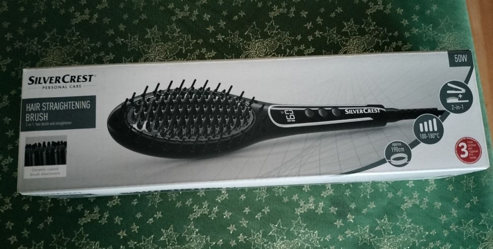 Perie electrica de îndreptat părul